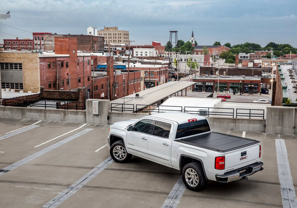 UnderCover Ultra Flex Hard Folding Truck Bed Tonneau Cover | UX42014 | Fits 2016 - 2023 Toyota Tacoma (fits w/ or w/o bedside storage boxes) 5' 1" Bed (60.5")