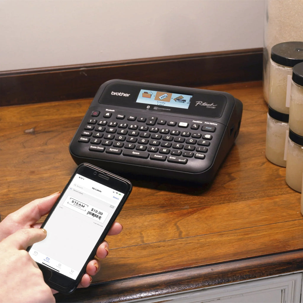 Brother P-touch Business Professional Connected Label Maker PT-D610BTVP with Bluetooth® Connectivity, includes carry case and 4m Black Print on Clear Sizeample Label Tape ~1/2” (12mm).