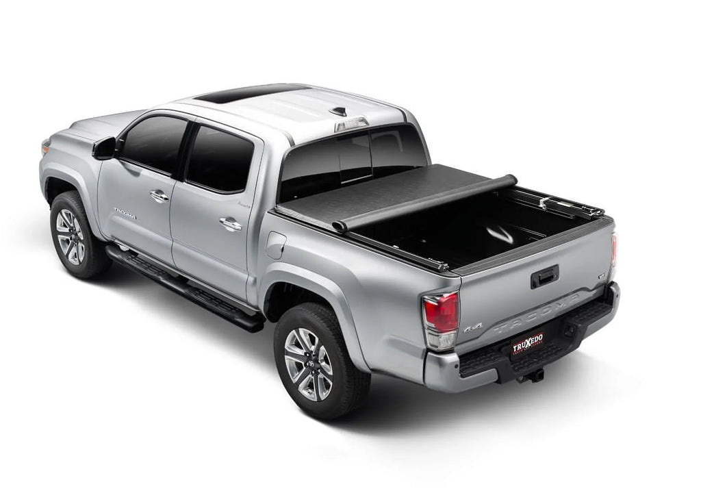 Truxedo Truxport Sizeoft Roll Up Truck Bed Tonneau Cover | 268101 | Compatible with 1999-2006 Toyota Tundra w/o Bed Caps 6' 4" Bed (76.1")