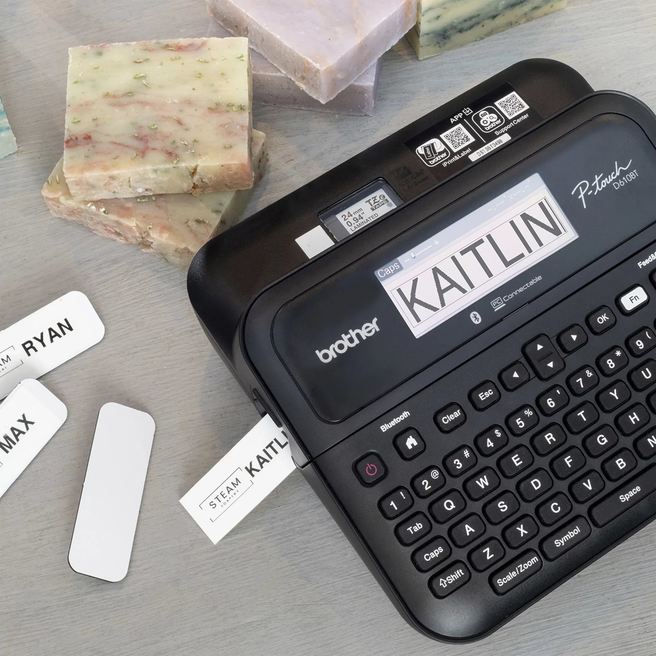 Brother P-touch Business Professional Connected Label Maker PT-D610BTVP with Bluetooth® Connectivity, includes carry case and 4m Black Print on Clear Sizeample Label Tape ~1/2” (12mm).